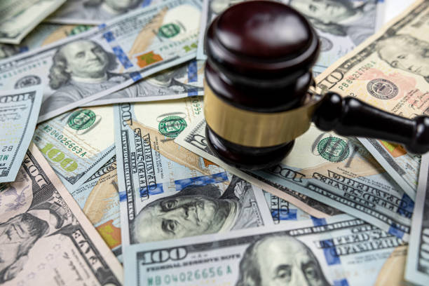 istock judge gavel and 100 dollar bills as background 1530383529