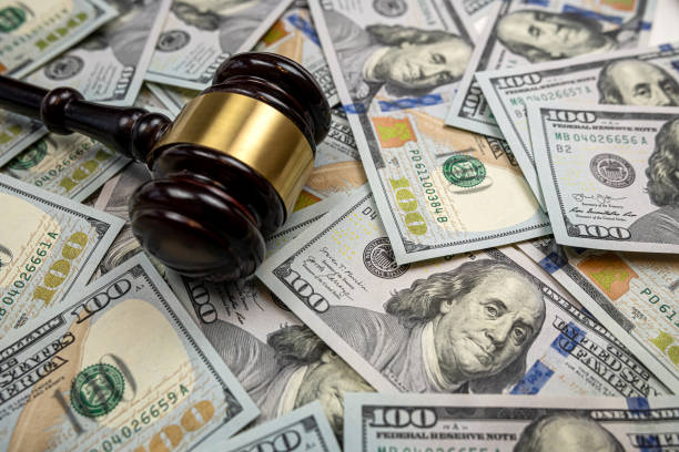 istock judge gavel and 100 dollar bills as background 1530405277