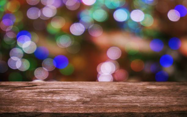 istock Empty wooden table in front of abstract bokeh background . can be used for display or montage your products.Mock up for display of product. for Christmas, new year celebration. 1530427415