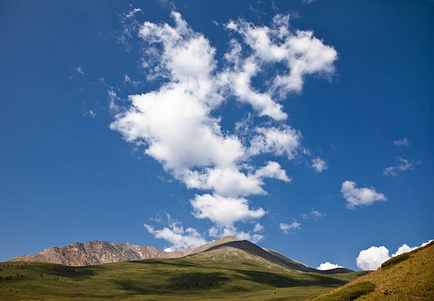 Clouds in Altay mountains, Russia stock photo