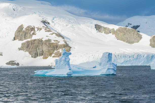istock Iceberg in antarctic ocean, antarctica, polar regions. 1530448441