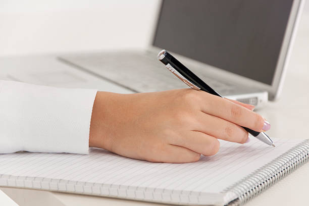 istock Businesswoman with pen 153045263