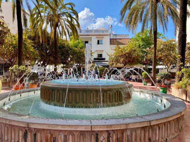 istock Fountain in a square in Estepona in Spain 1530457933