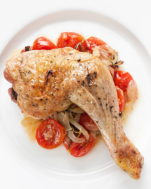istock Roast chicken with tomatoes, onions and herbs 153046114