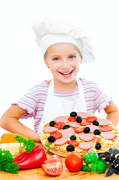 istock little girl preparing a pizza 153046276