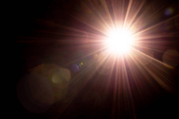 Blurred image Sun flare on the black background