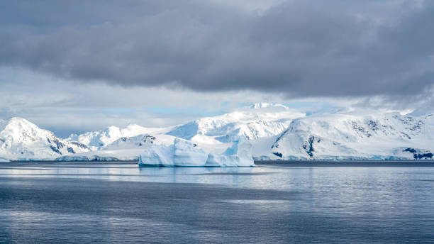 istock Antarctica mountains and sea. South Pole. On cloudy day 1530510826