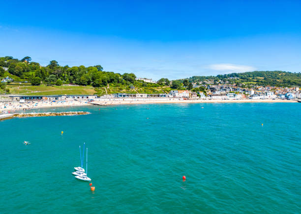 istock Across Lyme Regis beach with boats 1530521927