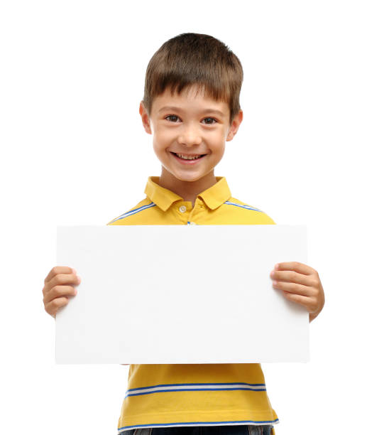istock Happy boy holding blank poster 153052736