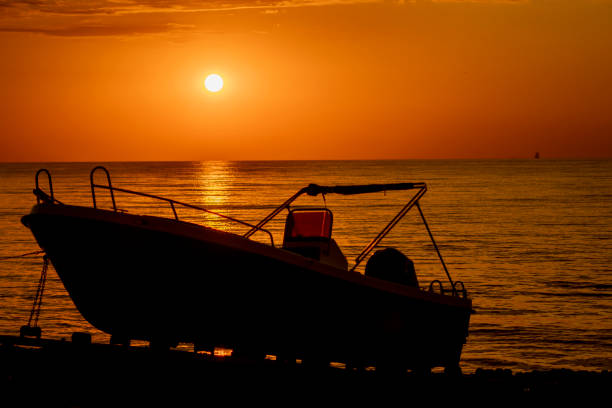 Istanbul, Turkey : July 09, 2023: Boat and beautiful sunset time of the Istanbul, Turkey