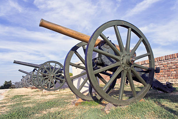 istock Old cannons on fortress over blue sky 153053578