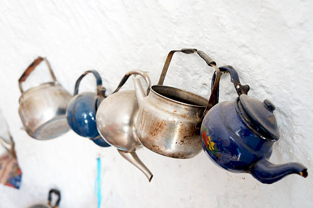 Old metallic teapots stock photo