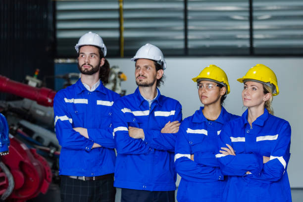istock Team engineering worker technician, workshop manufacturing, Teamwork in industry factory. group professional technician industrial. 1530538729