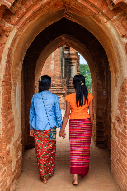 istock Young Burmese girls walking in Bagan, Myanmar 1530552351