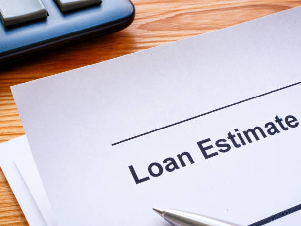 istock Papers with loan estimate and pen on the table. 1530556126