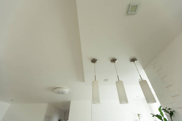 istock Gypsum board ceiling of house at construction site 1530573584
