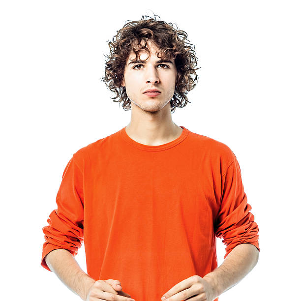 istock young man serious looking at camera portrait 153057462