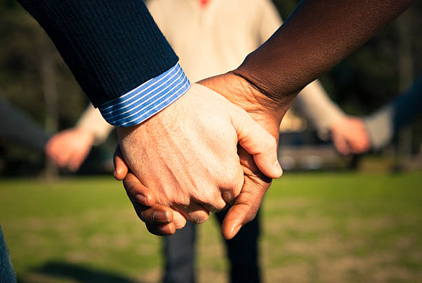 istock Holding hands, multiracial couple in love 153059711