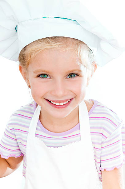 istock girl dressed as a cook 153060203