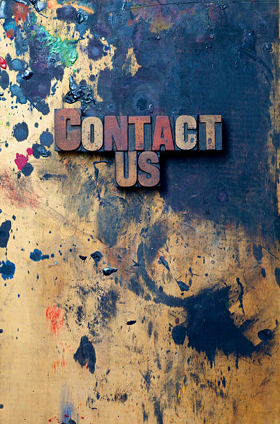 Contact Us The words Contact Us written in antique letterpress printing blocks… typescript print letterpress block stock pictures, royalty-free photos & images