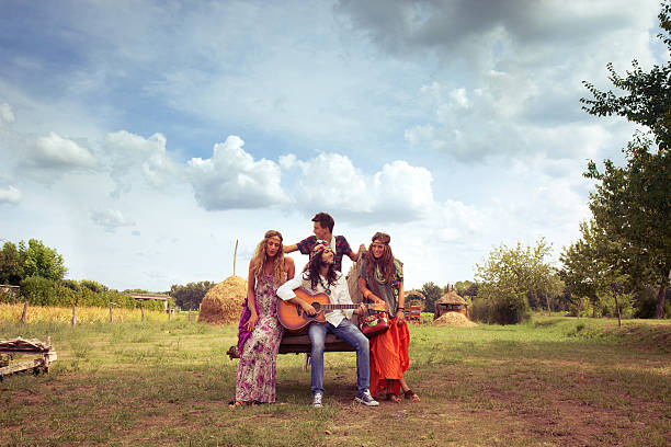 istock Hippie group play guitar in Countryside 153061335