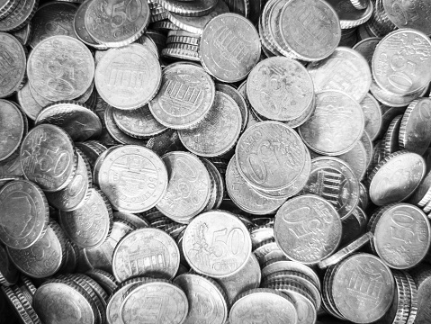 Pile of 50 cent coins - black - white photo
