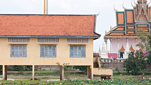 School building and temple in Cambodia stock photo