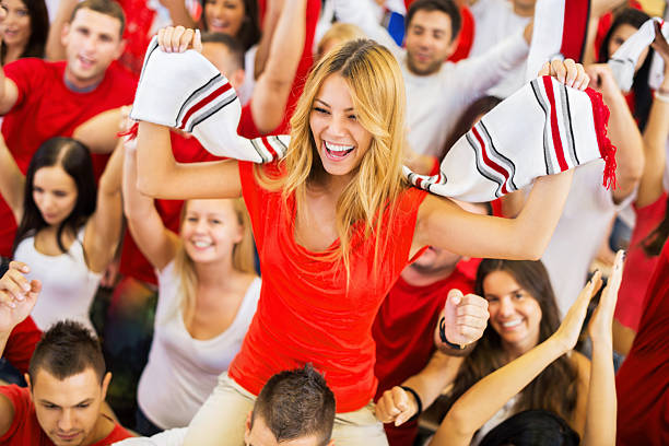 istock Group of sport fans cheering. 153063904