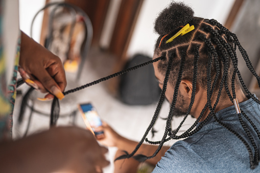 Man with rastafarian afro hair