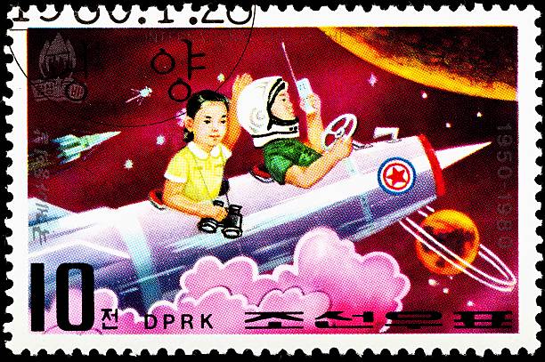 istock Children Riding a Rocket in Outerspace 1980 153064085