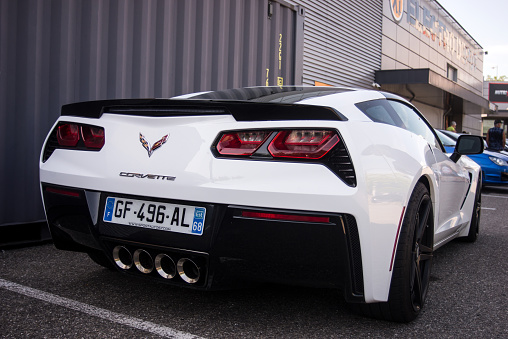 Mulhouse - France - 9 July 2023 - Rear view of white chevrolet corvette parked in the street