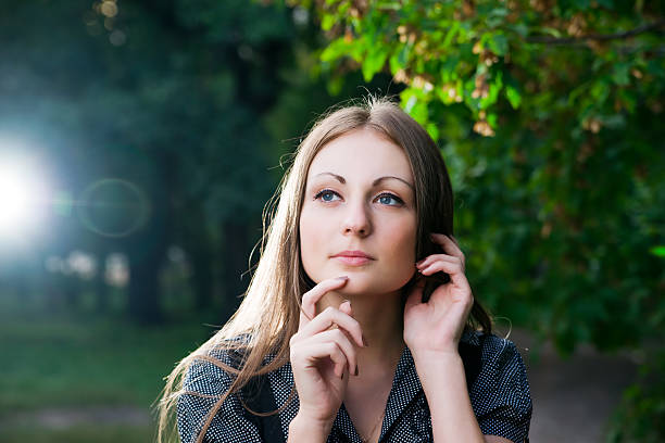 Portrait of a young woman in the park.