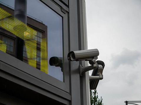 Surveillance camera on the facade of the building. Video surveillance system.