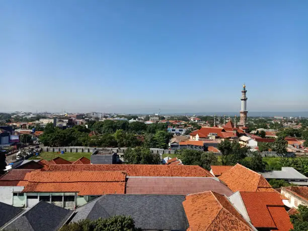 Photo of The landscape of Cirebon City with view of Great Mosque and Mount Ciremai at the Background