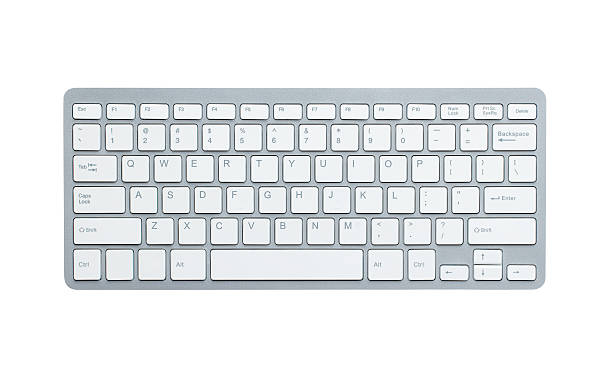Computer keyboard with clipping path Modern aluminum computer keyboard isolated on white background with clipping path computer key photos stock pictures, royalty-free photos & images