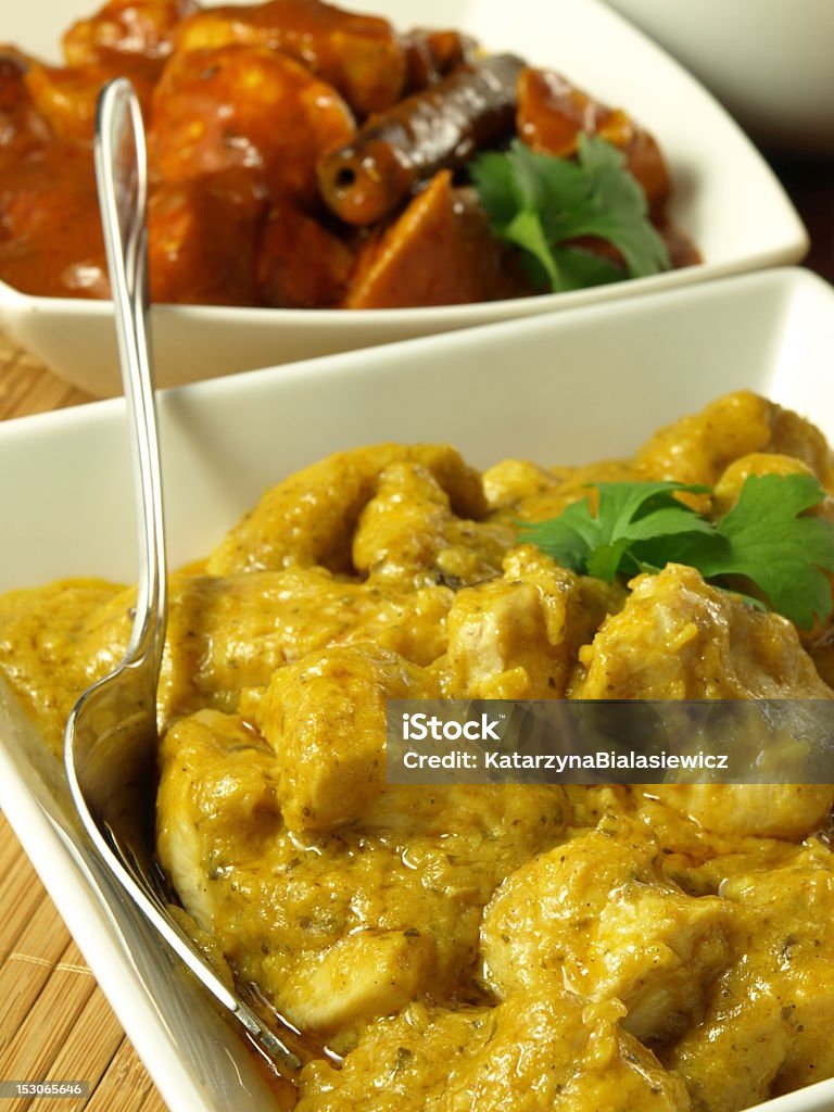 Indian chicken Closeup of two types of indian curry dish Chicken - Bird Stock Photo