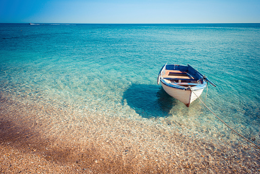 Typical greek small boat in the sea.