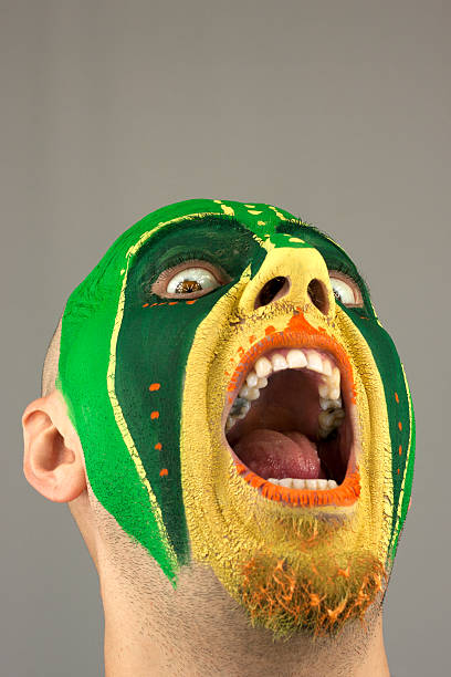 istock Painted face of screaming young man 153066423