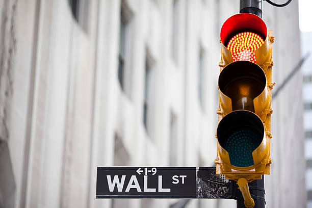 istock Wall street and red traffic  light 153068836