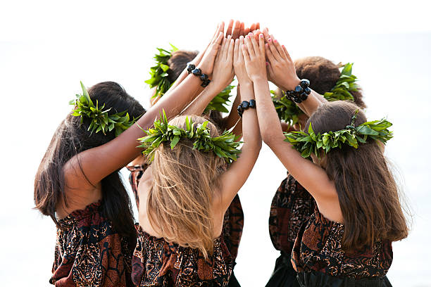 Friendship Dance Group of Dancers come together United as a team and friends hula dancing stock pictures, royalty-free photos & images