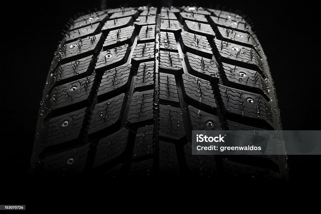 Winter tire winter tire isolated on black Form - Document Stock Photo