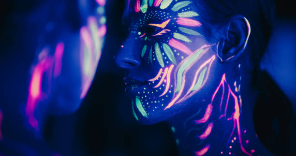 istock Powerful Solo Performance by a Talented Female Performer, Infusing Stylish Improvisation and Innovativeness in Her Abstract Modern Dance. Close Up Portrait of a Girl with Bohemian Face and Body Paint 1530714813