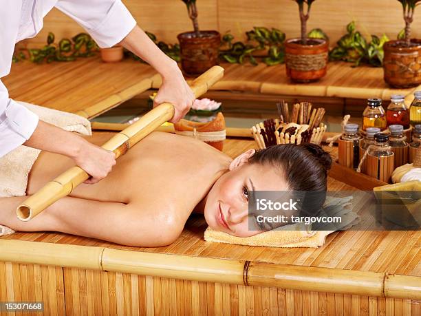 Bamboo Massage Stock Photo - Download Image Now - Bamboo - Material, Bamboo - Plant, Massaging