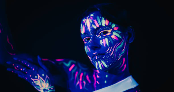 Creative Young Female Covered In Neon Body Paint Performing Modern Dance  Choreography In A Studio With Abstract Art Background Beautiful  Contemporary Dancer Expressing Her Inner World Through Dance Stock Photo -  Download