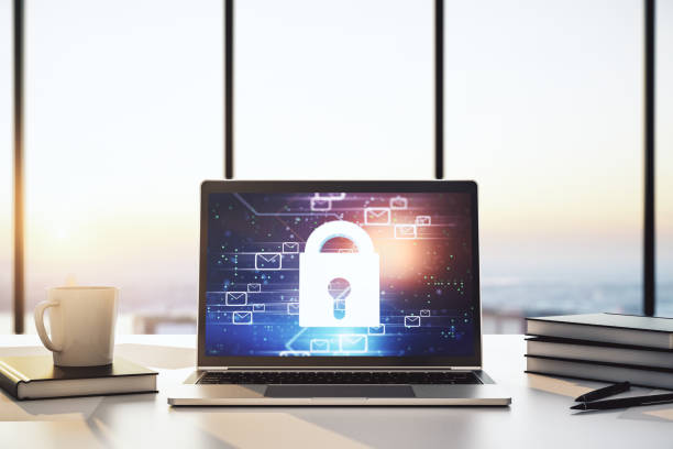 istock Modern computer monitor with creative lock hologram and email symbols. Information security concept. 3D Rendering 1530729607