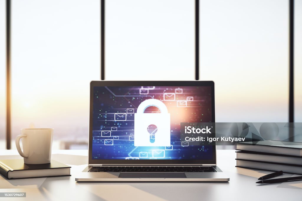 Modern computer monitor with creative lock hologram and email symbols. Information security concept. 3D Rendering Privacy Stock Photo