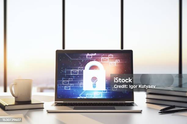 Modern Computer Monitor With Creative Lock Hologram And Email Symbols Information Security Concept 3d Rendering Stock Photo - Download Image Now