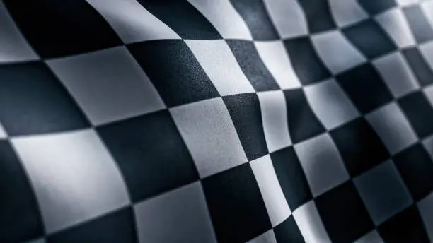 Waving Racing finish flag with checkered pattern texture in slow motion