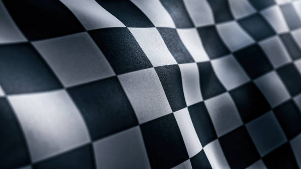 bandeira de acabamento de corrida ondulante com textura de padrão quadriculado em câmera lenta - checkered flag flag the end motorized sport - fotografias e filmes do acervo