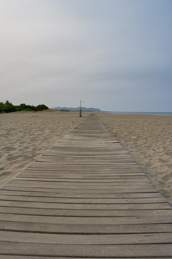Wooden footpath on the beach
